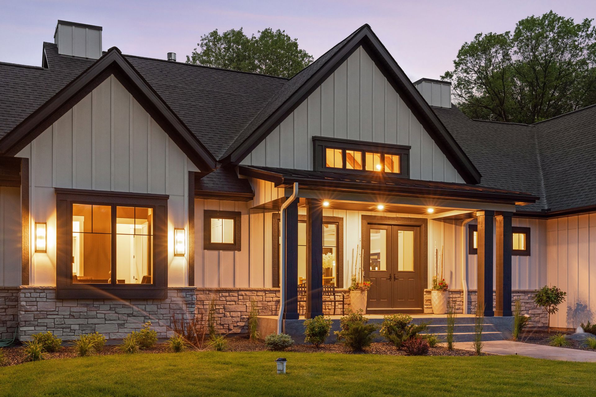 Home beautifully illuminated at dusk